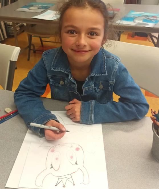 Smiling Girl drawing