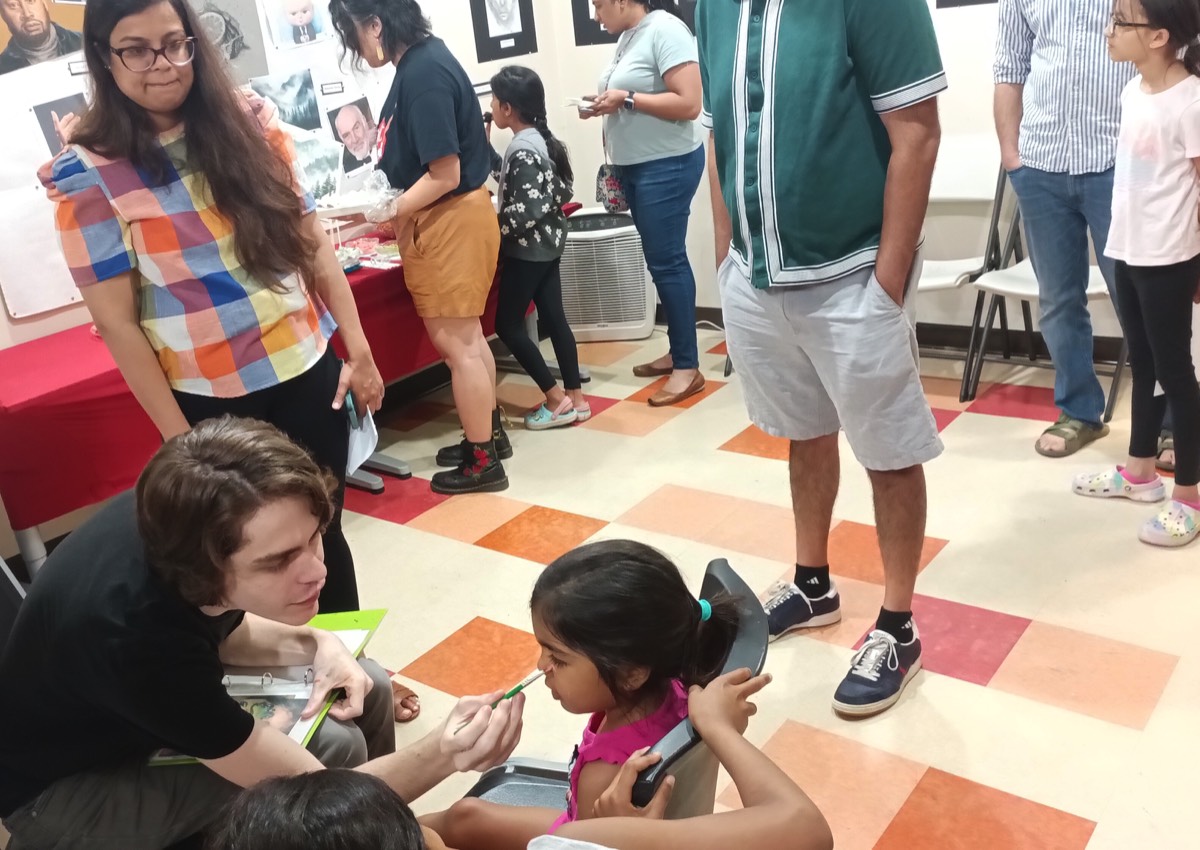 kids getting their faces painted