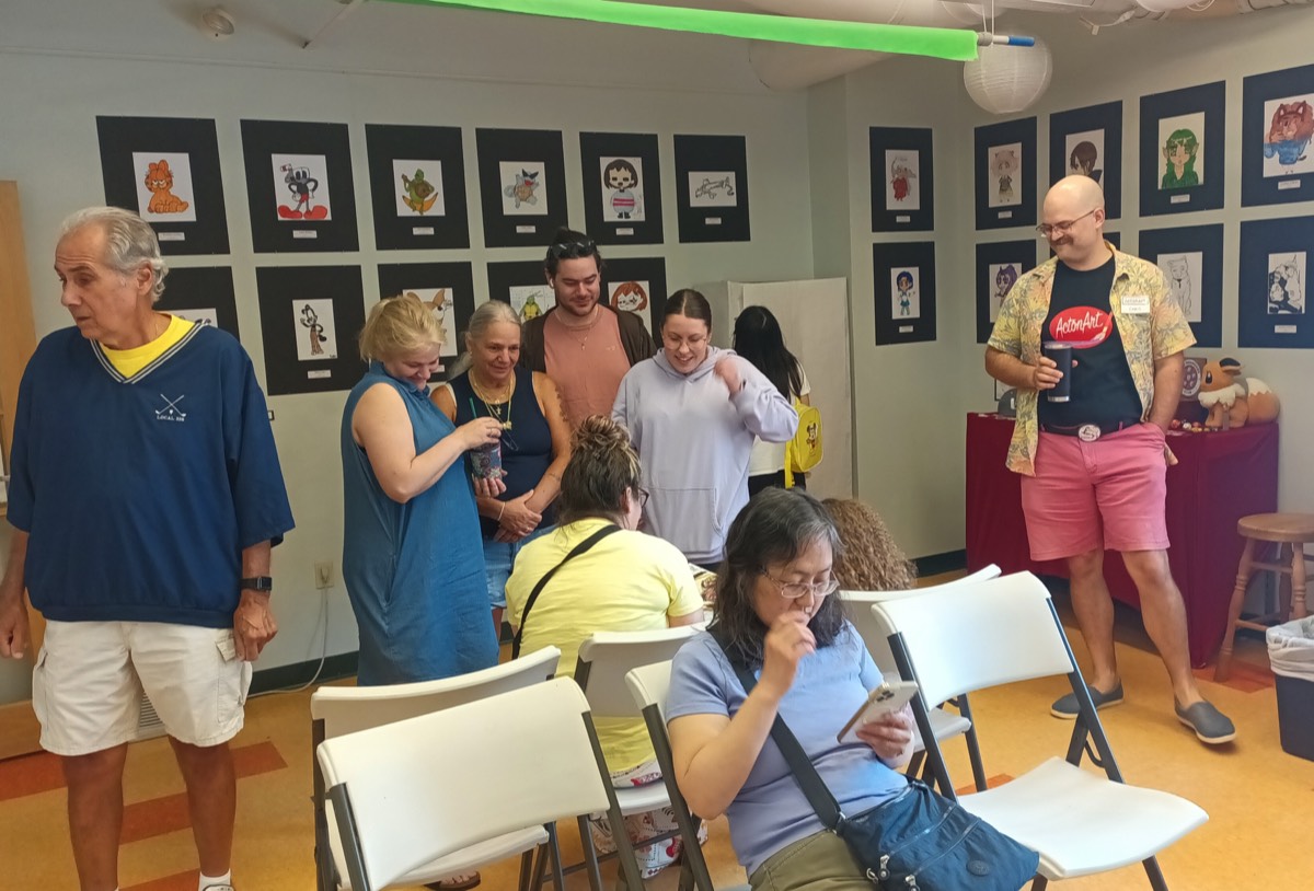 visitors admiring artwork